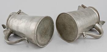 SKÄNKSTOP, 2 st, tenn, bl a Gustav Eklöf, stämplade i Vänersborg, 1815-1833.