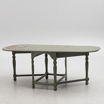 A painted gate leg  table, 19th century.