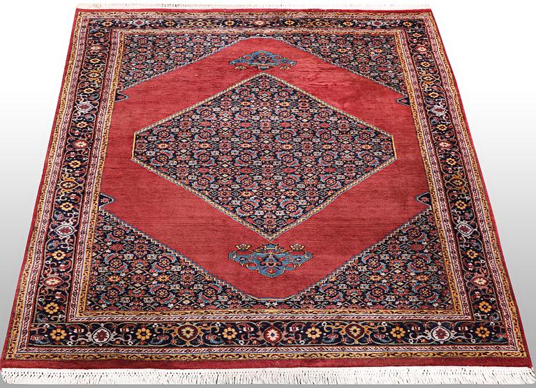 A rug, Tabriz, ca 241 x 167 cm.