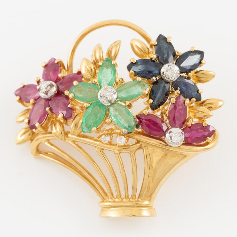 Brooch 18K gold set with round brilliant-cut diamonds as well as emeralds, sapphires, and rubies.