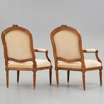 A pair of Louis XVI late 18th century armchairs.