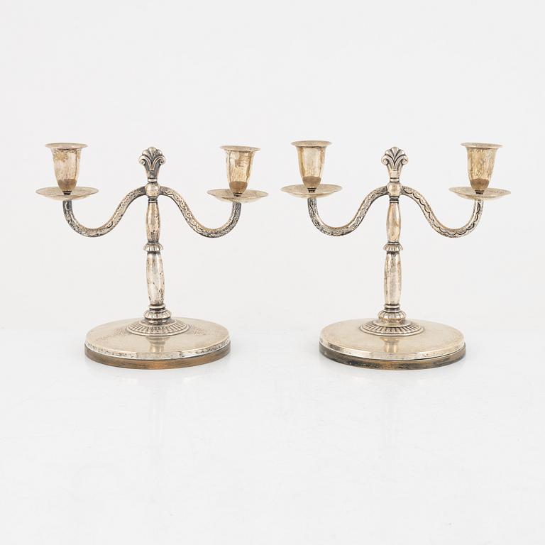 A pair of Swedish silver candlesticks, mark of CG Hallberg, Stockholm 1926.