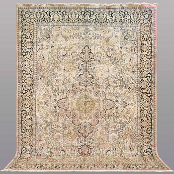 A CARPET, old silk Kashmir, ca 380 x 274 cm.