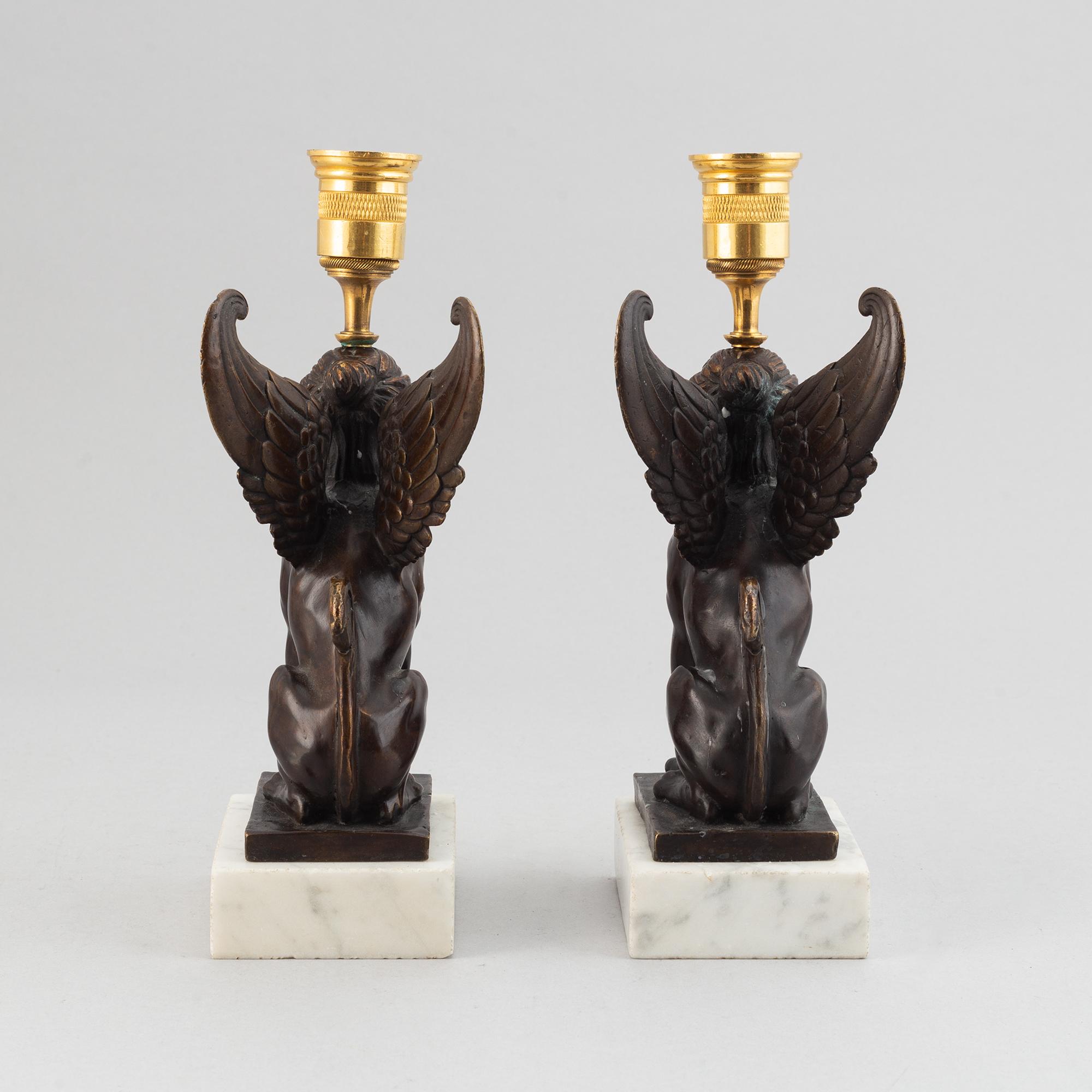 A pair of presumably Russian Empire candlesticks, early 19th Century.