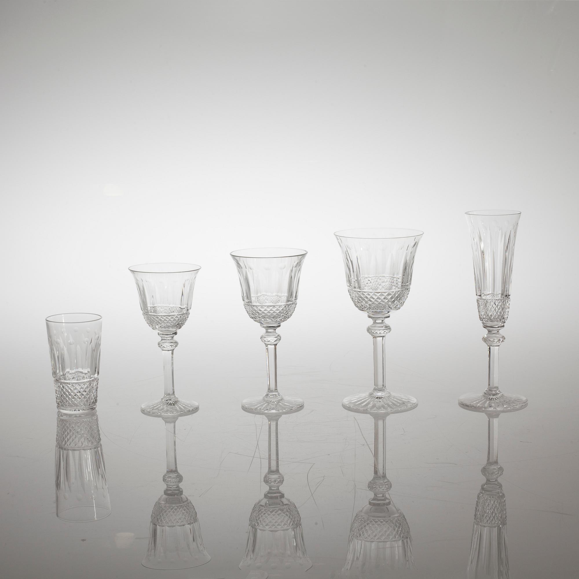 A glass tableware collection of 61 pcs, "Tommy" by Saint-Louis, France, late 20th century.