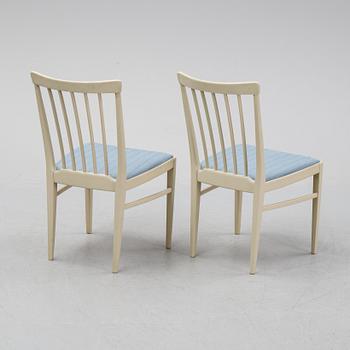 A dining table with six chairs by Carl Malmsten, second half of the 20th Century.