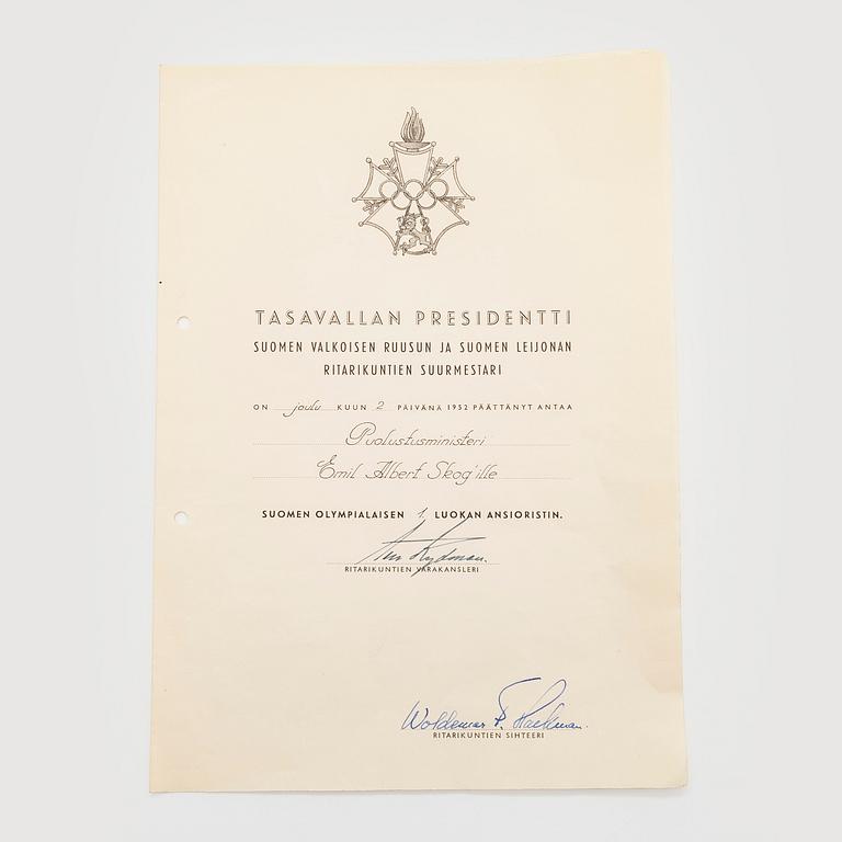 The Finnish olympic cross, 1st class, silver and enamel. Tillander, Helsinki and a Guest of Honor pin.