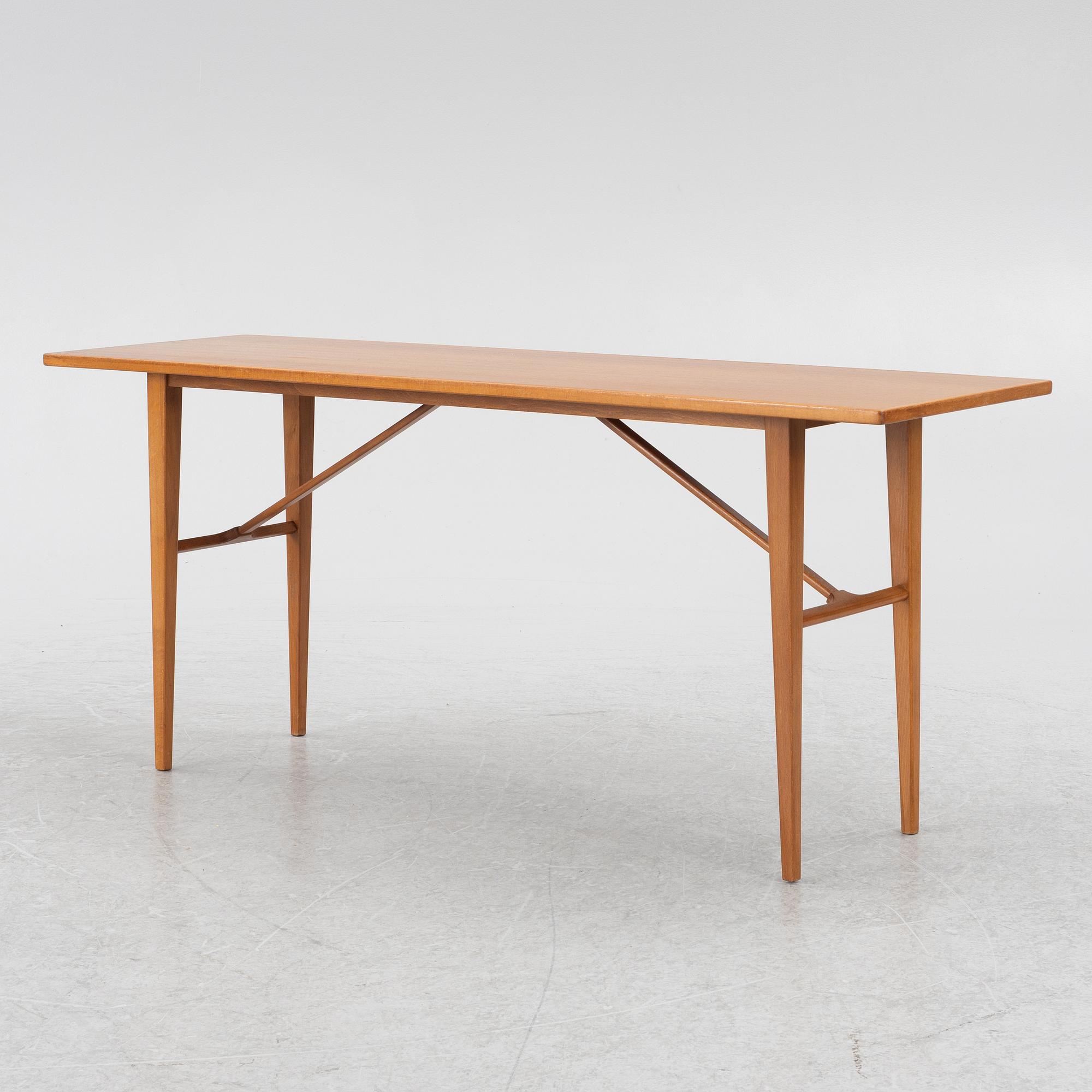 A coffee table/side table, Blomstermåla, circa the mid-20th century.