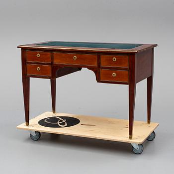 A mahogany veneered Gustavian style desk, circa 1900.