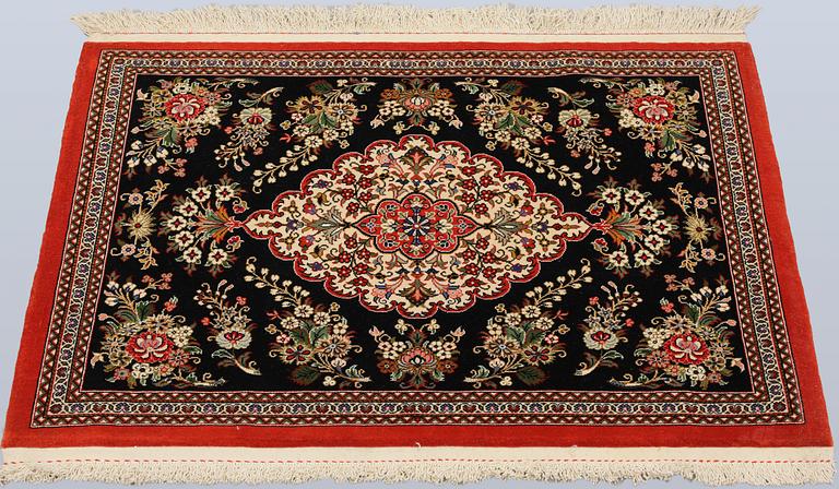 A pair of Tabriz rugs, part silk, so-called 50 Raj, 92 x 62 cm.
