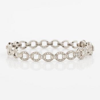 Bracelet in platinum set with round brilliant, octagonal, and rose-cut diamonds.