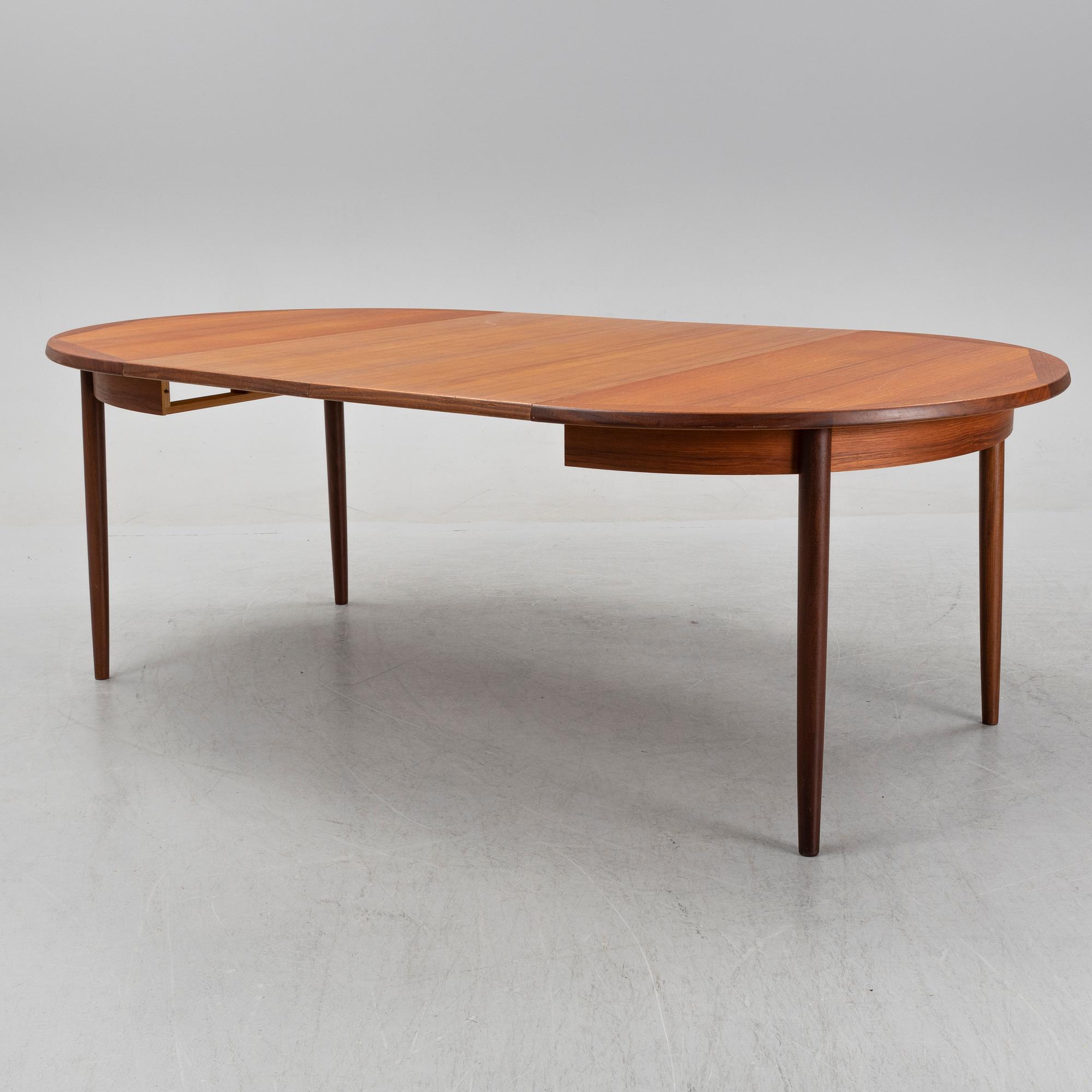 A teak 1950's/60's dining table.