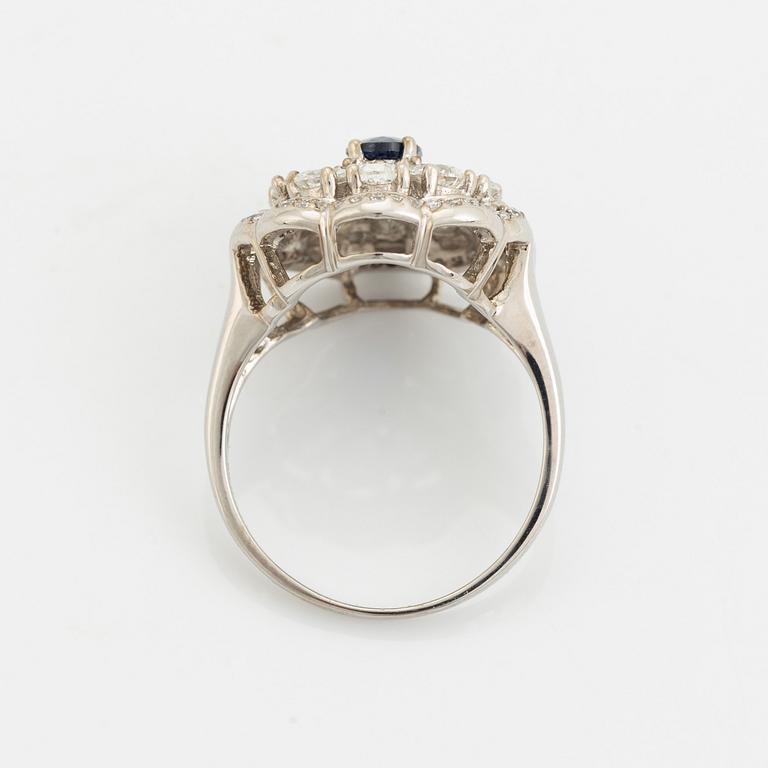 Sapphire and pear and brilliant cut diamond ring.