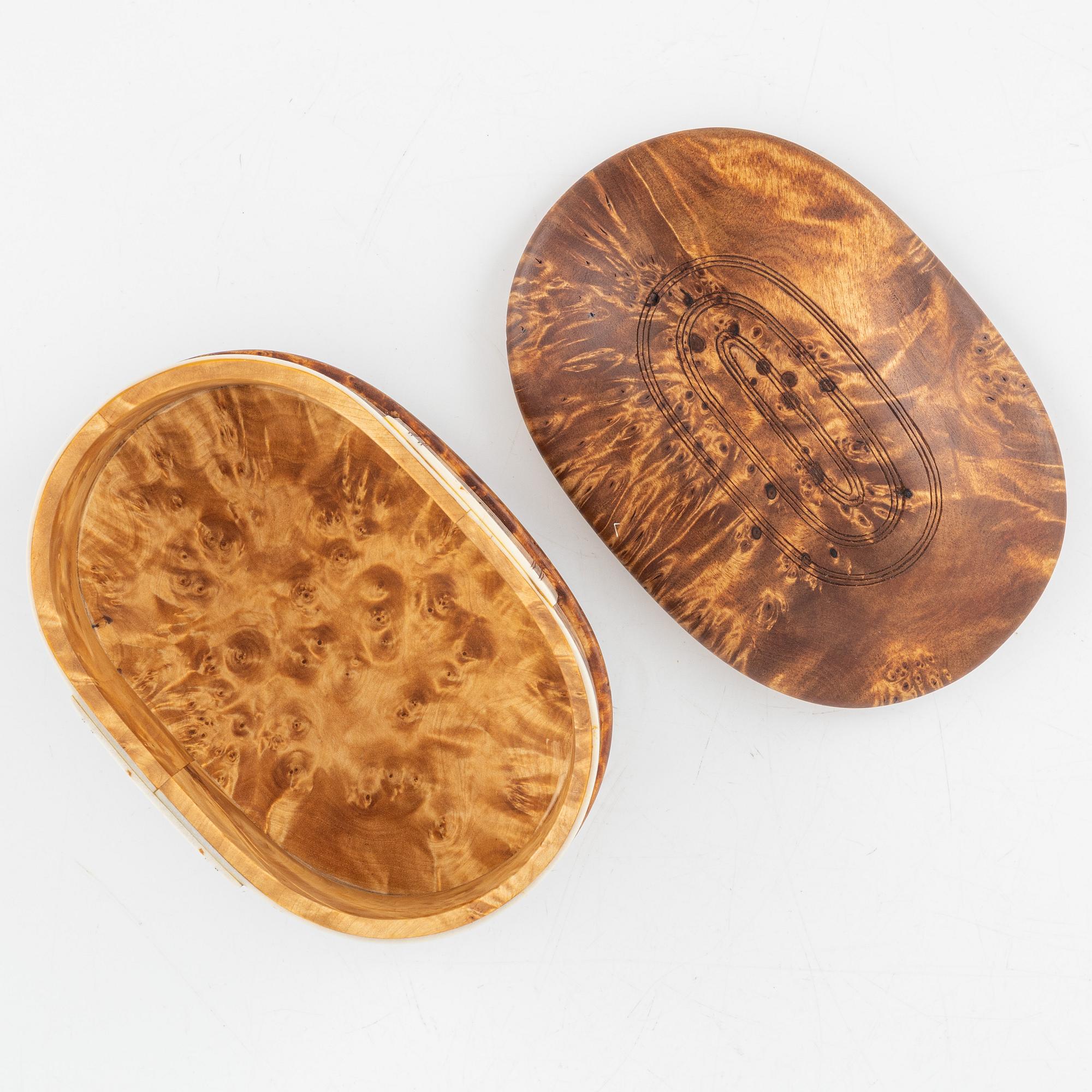 Esse Poggats, a birch and reindeer horn box, signed.