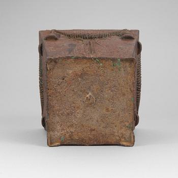 An early 19th century flower pot of cast iron.