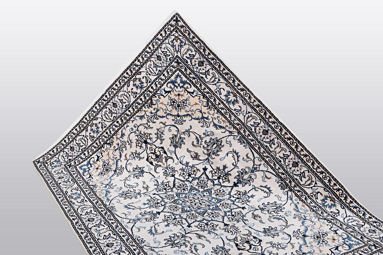 A rug, Nain, part silk, so called 9 LAA, ca 233 x 164 cm.