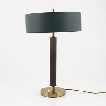 Einar Bäckström, a brass and rosewood table light, Malmö, mid 20th Century.