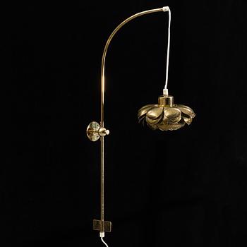 A model 2600 brass wall lamp by Josef Frank for Firma Svenskt Tenn.