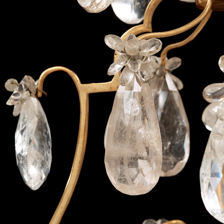 A late Baroque-style rock crystal twelve-light chandelier, circa 1900.