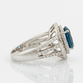 Topaz and brilliant cut diamond ring.