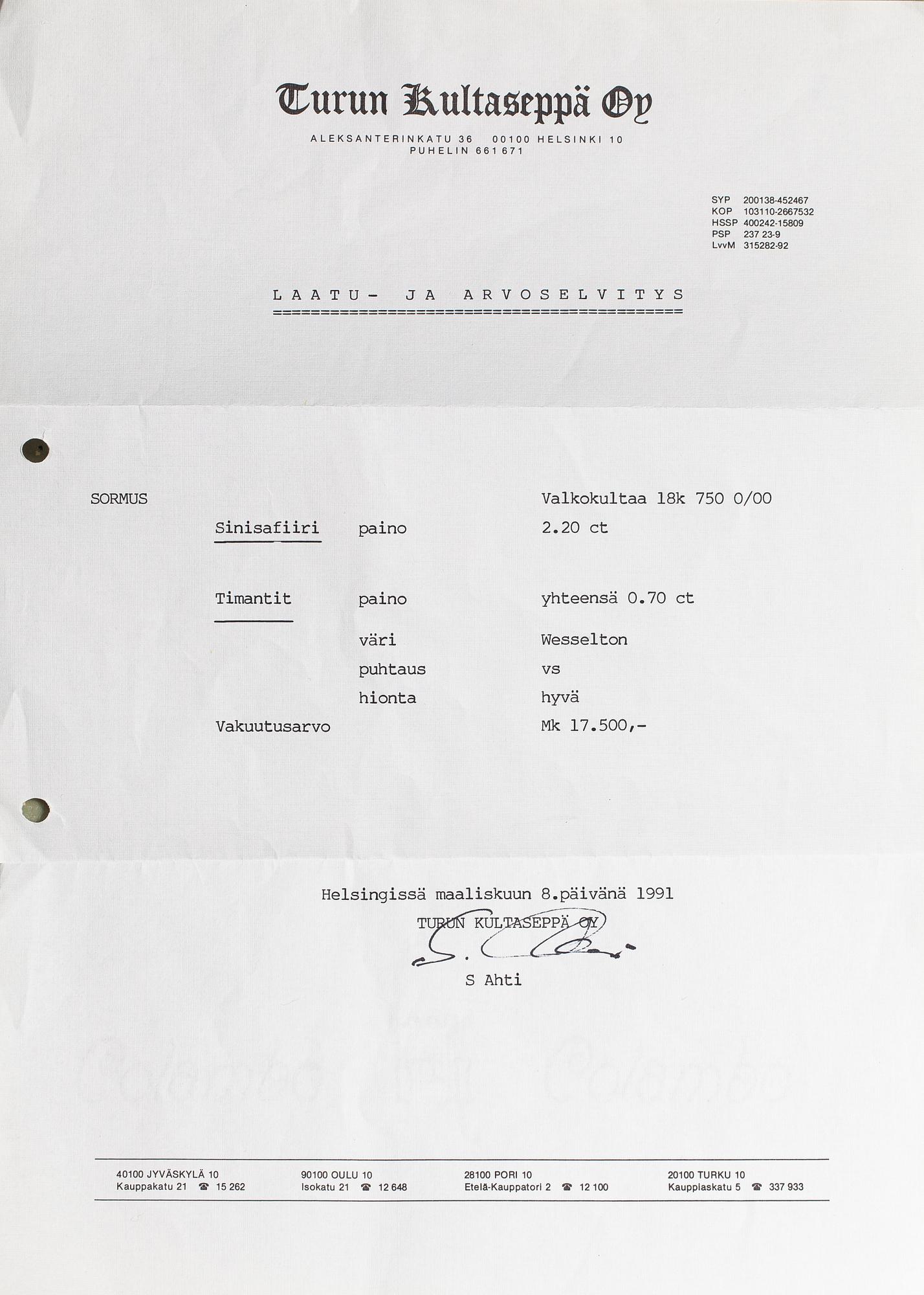 Sormus, 18K valkokultaa, safiiri n. 2.20 ct ja timantteja n. 0.70 ct yht. Suomalaiset tuontileimat 1991.