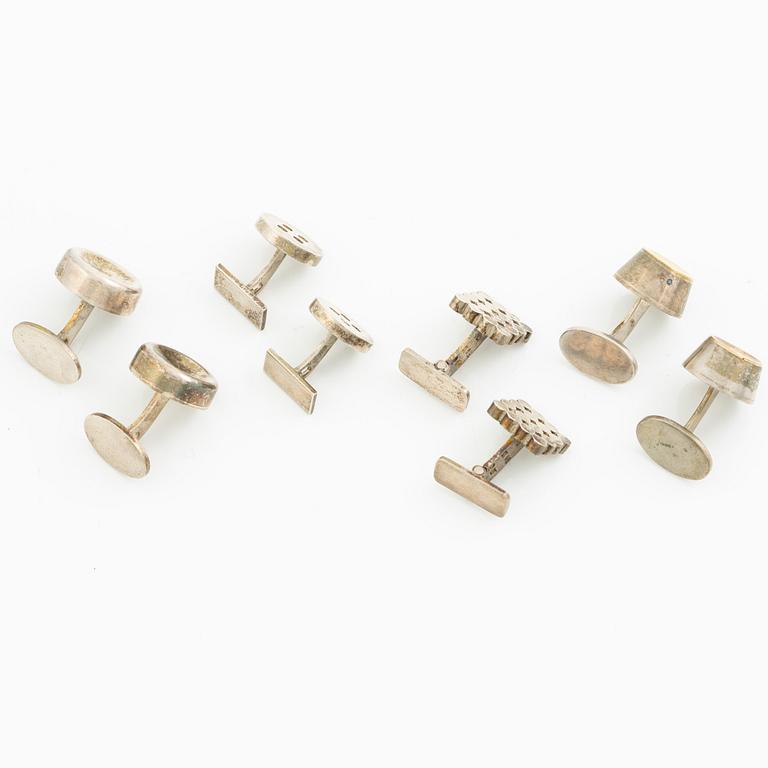 Four pairs of cufflinks, silver, including those by Anders Högberg and Cecilia Johansson.