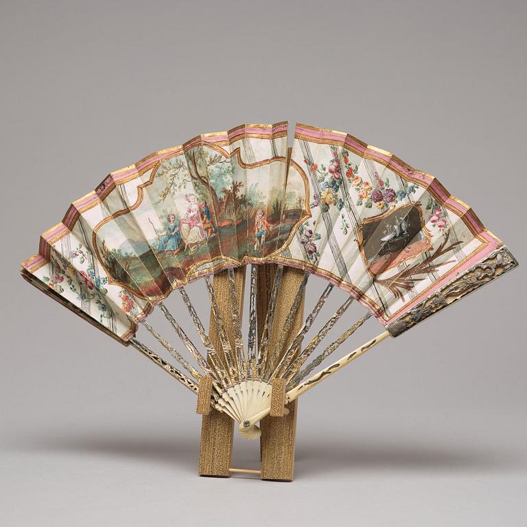 A set of four fans and a stand, 19th/20th Century.