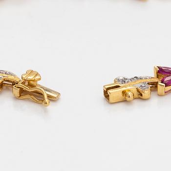 An 18K gold bracelet, with diamonds and rubies.