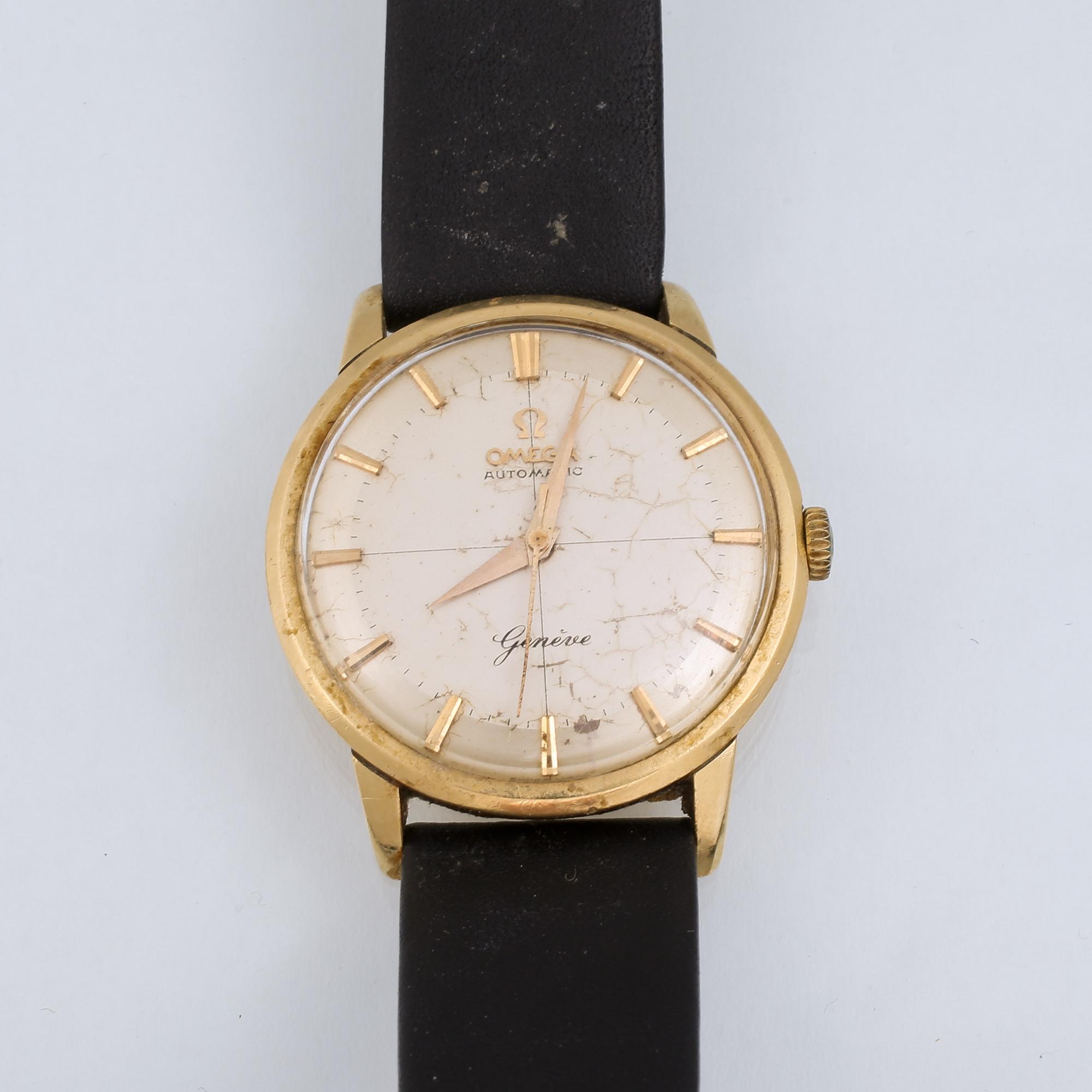 ARMBANDSUR, herr, boett i 18 k guld, "Genève", Omega, total vikt 38 g.