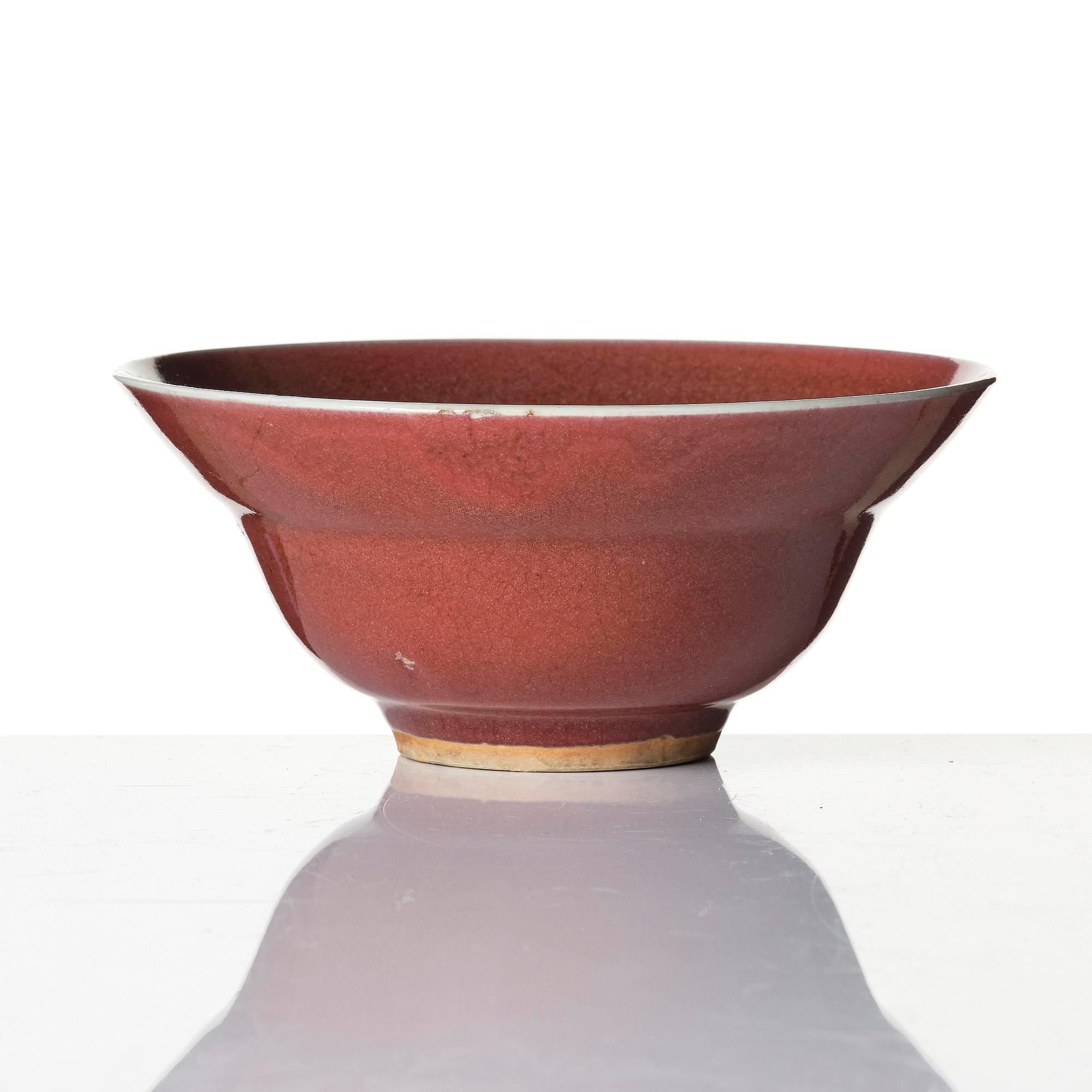 A red glazed bowl, Qing dynasty, 18th century.
