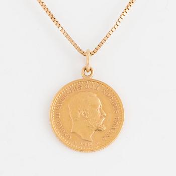 A goldcoin with 18K gold chain.