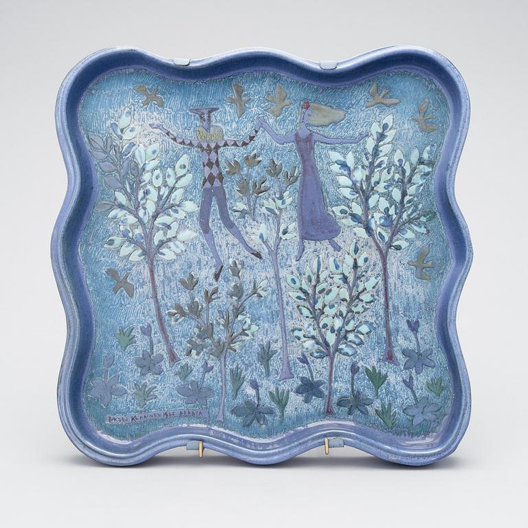 BIRGER KAIPIAINEN, A CERAMIC DISH. The boy and the girl. Signed Birger Kaipiainen, Arabia. 1940s.