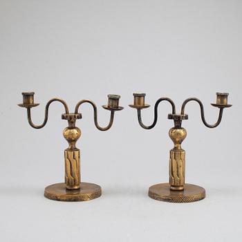A pair of bronze candelabra, marked H. Bergman, 1920's/30's.