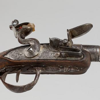 An end of the 18th century flintlock pistol, with makers name Dubois on the lockplate, France.