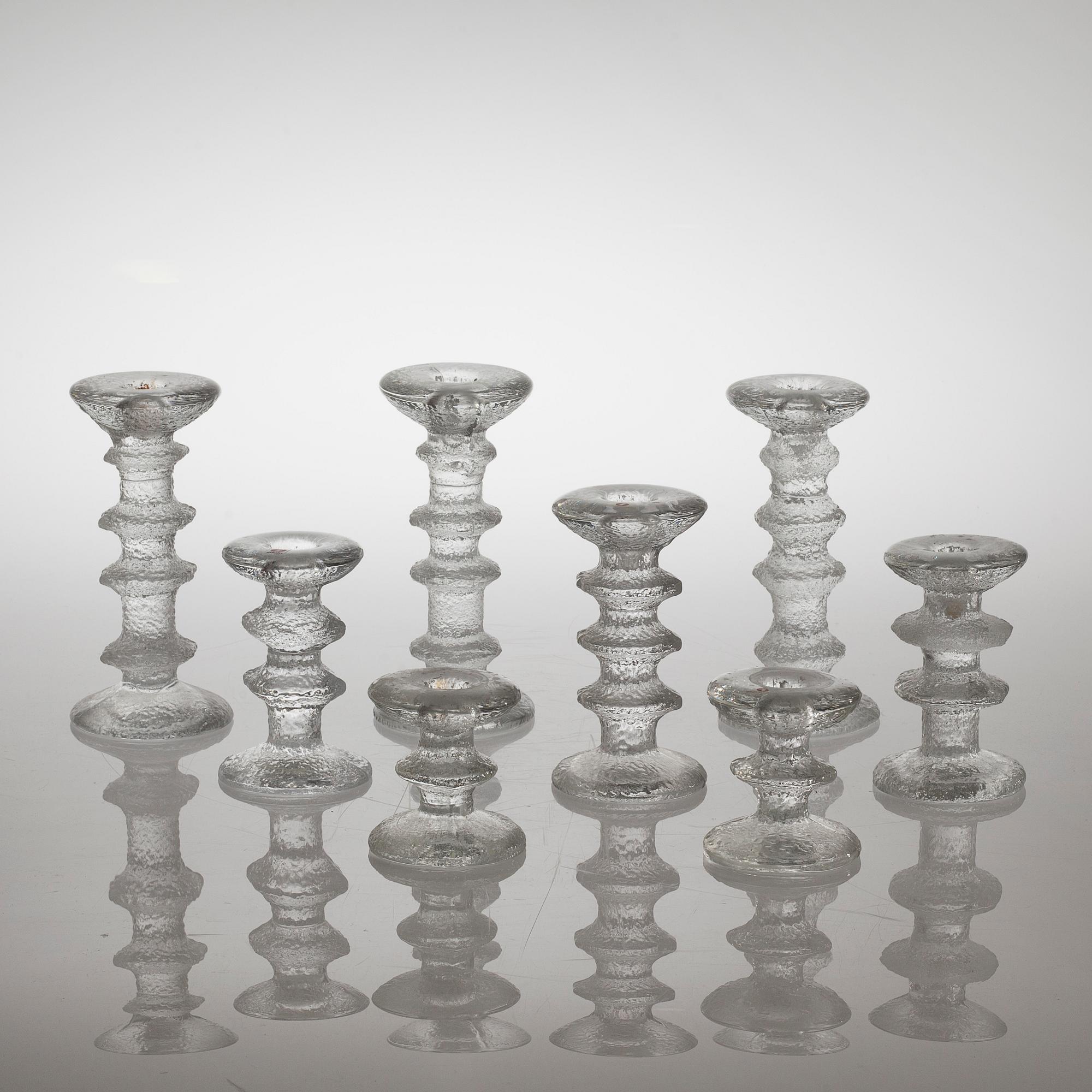Eight "Festivo" glass candlesticks by Timo Sarpaneva for Iittala, Finland from the second half of the 20th century.