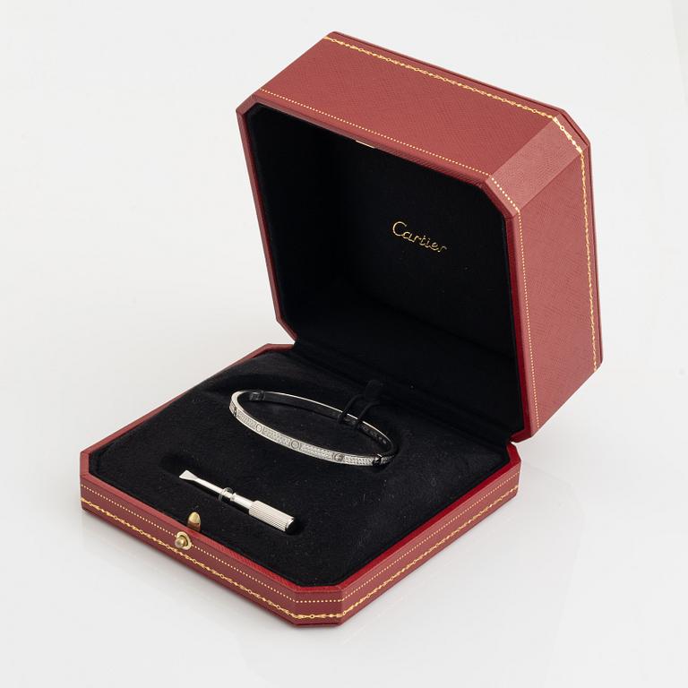 A Cartier "Love" bracelet small model in 18K white gold with round brilliant-cut diamonds.