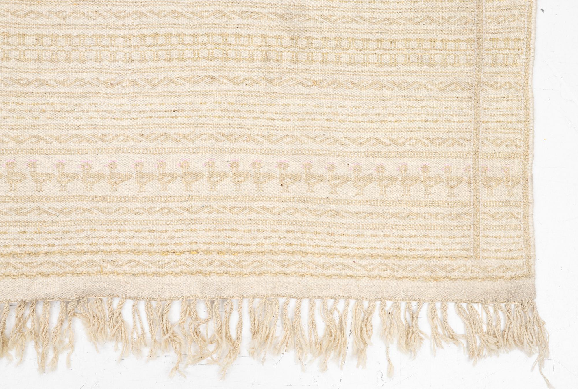 A Kilim part-silk carpet, c. 257 x 241 cm.