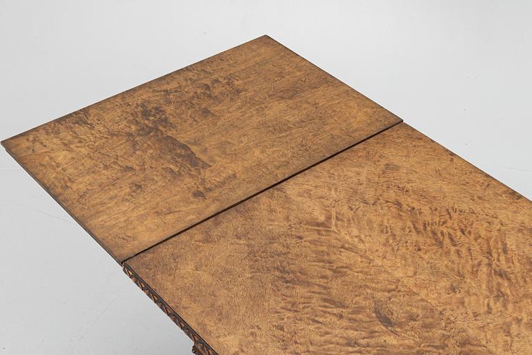 A dining table, 1920s.