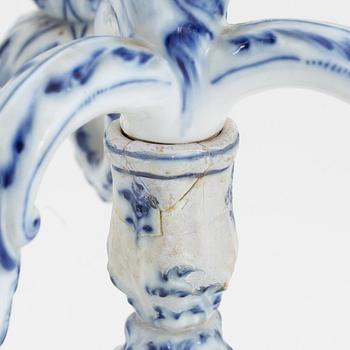 A pair of rococo style porcelain candelabras, Meissen, Germany, early 20th century.