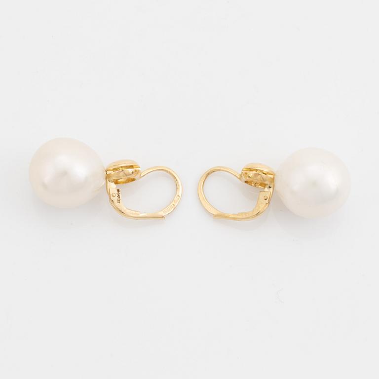 Freshwater pearl and colour treated yellow diamond earrings.