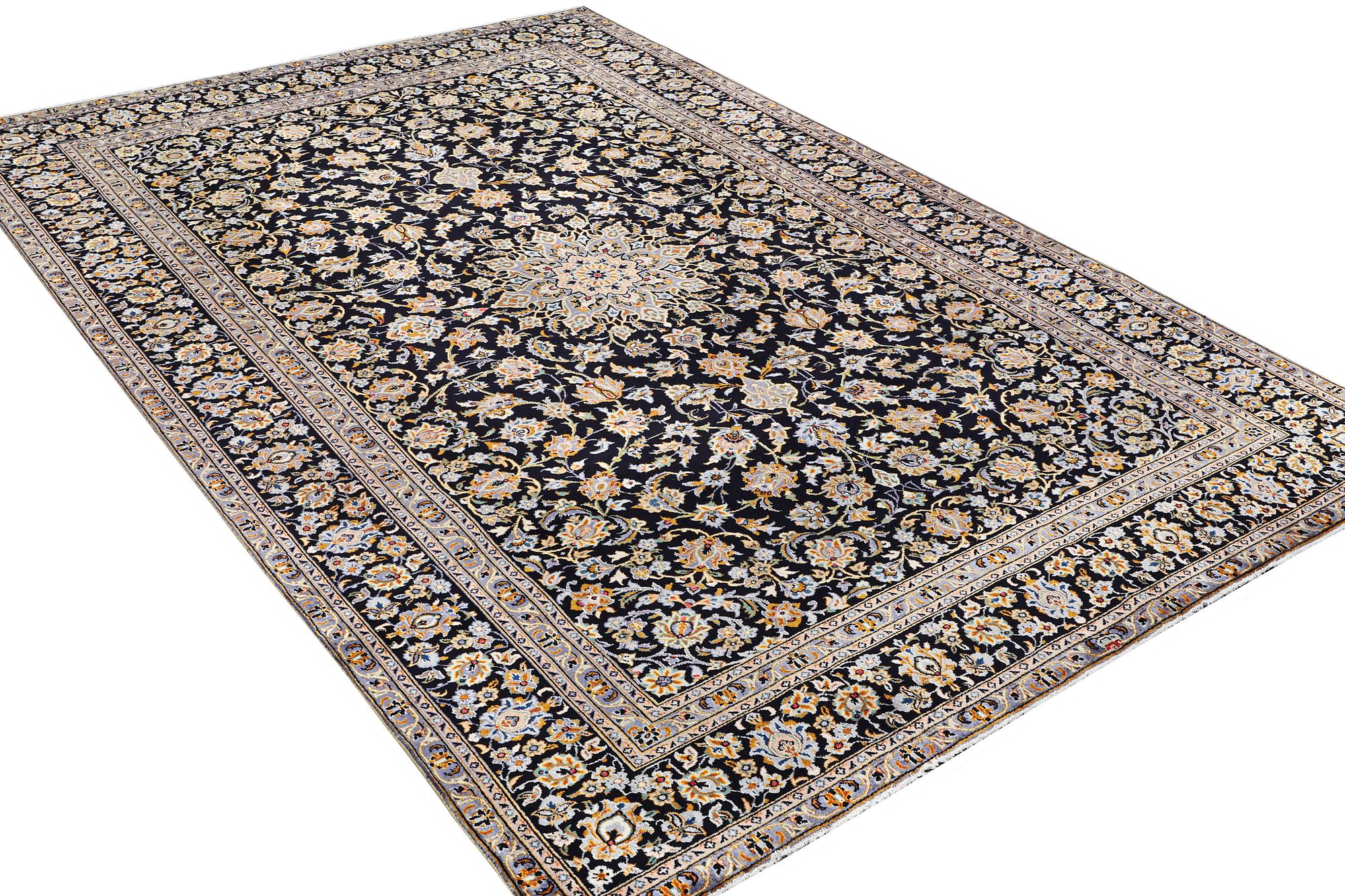 A Kashan carpet, signed, c. 410 x 270 cm.