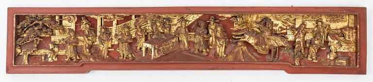 A carved wooden relief, China, late Qing dynasty, late 19th century.