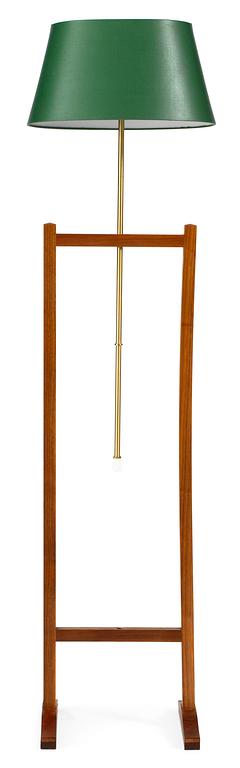 A Josef Frank walnut and brass floor lamp, Firma Svenskt Tenn.