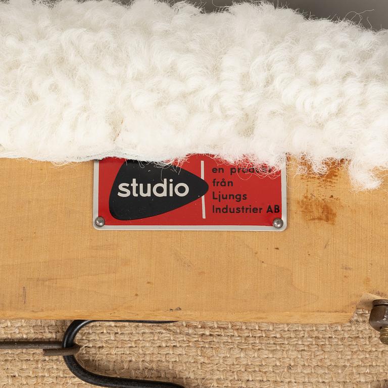 Alf Svensson, a 'TeVe', easy chair with new sheepskin upholstery, Bra Bohag, Studio Ljungs Industrier, 1950s.