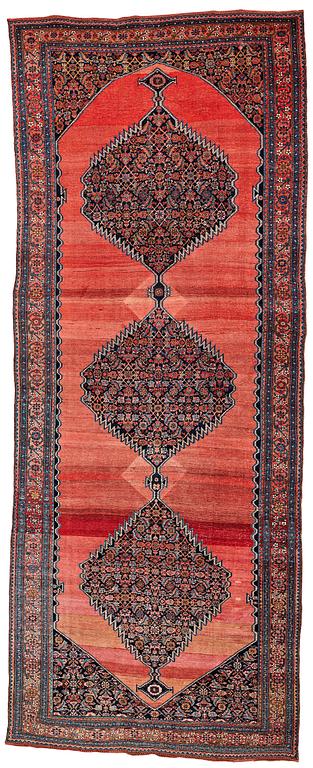 A CARPET, an antique Bidjar kelly, ca 587 x 230 cm.