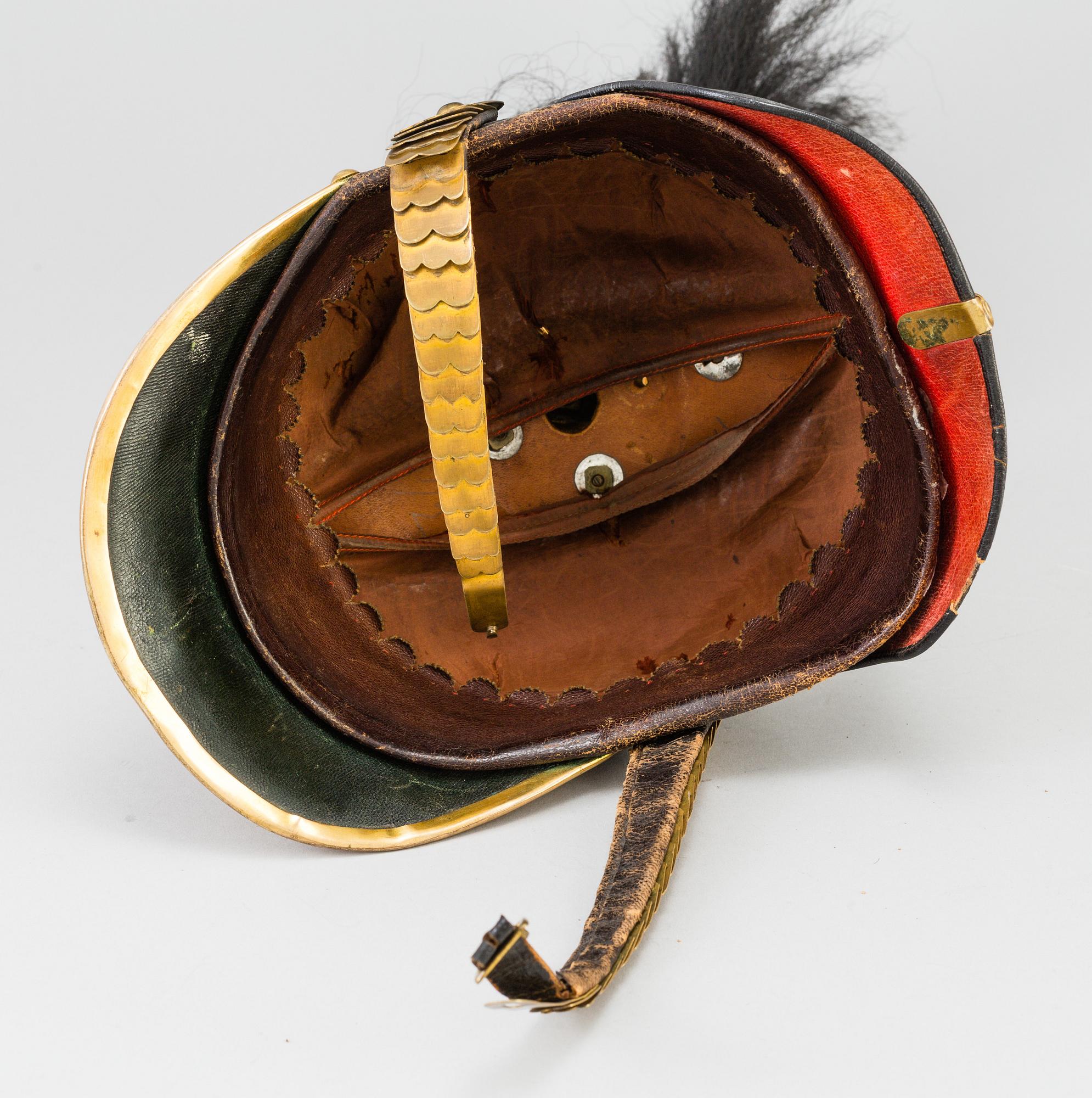A Swedish military 
officer helmet m/1894.