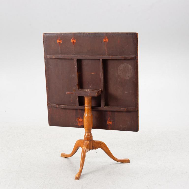 A burr alder tilt-top table, Mälardalen, circa 1800.