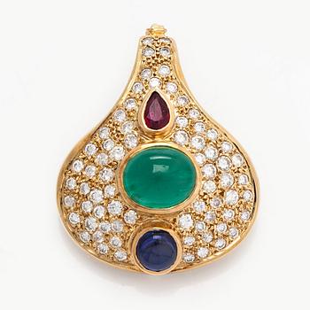 An ca. 18K gold pendant with a tourmaline, cabochon-cut emerald and sapphire and brilliant-cut diamonds.