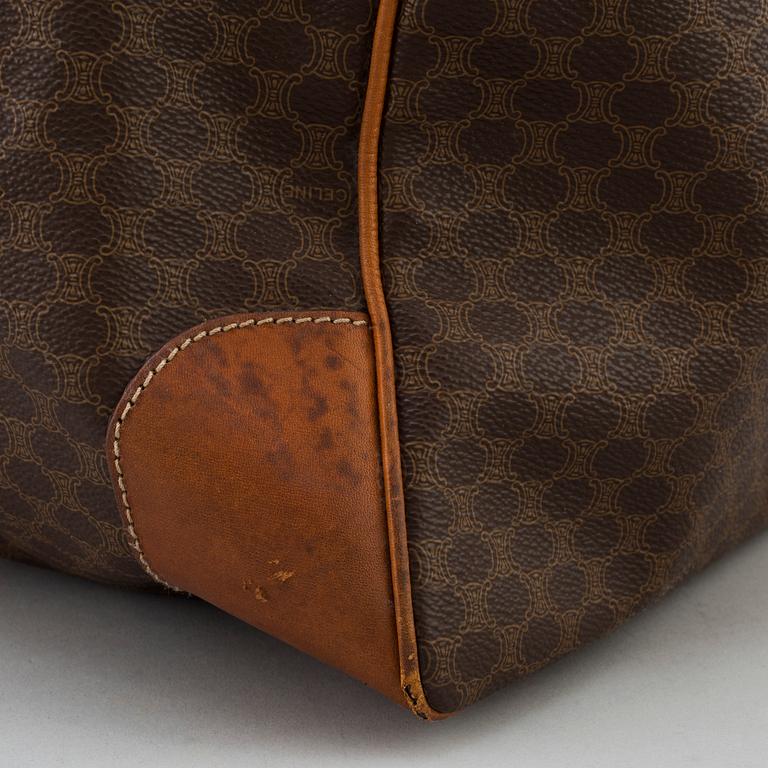 a CÉLINE "Macadam Boston 50" weekendbag.