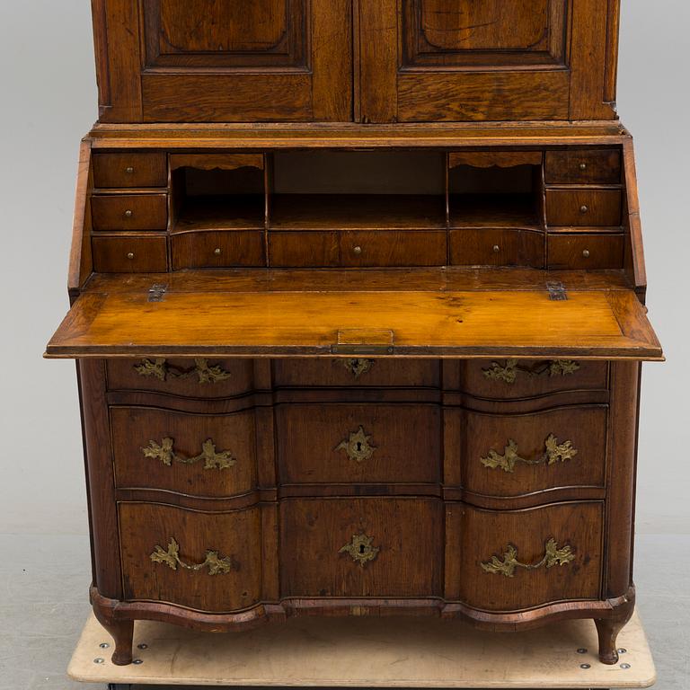 A mid 18th century rococo cabinet.